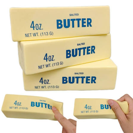 Butter Squishy soft slow-rising foam toy shaped like a stick of butter