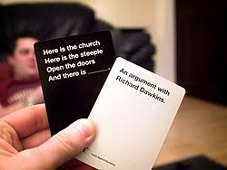 Cards Against Humanity party card game box and cards